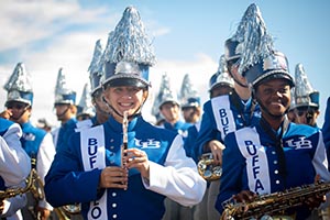 Several members of UB's marcching band in their uniforms.